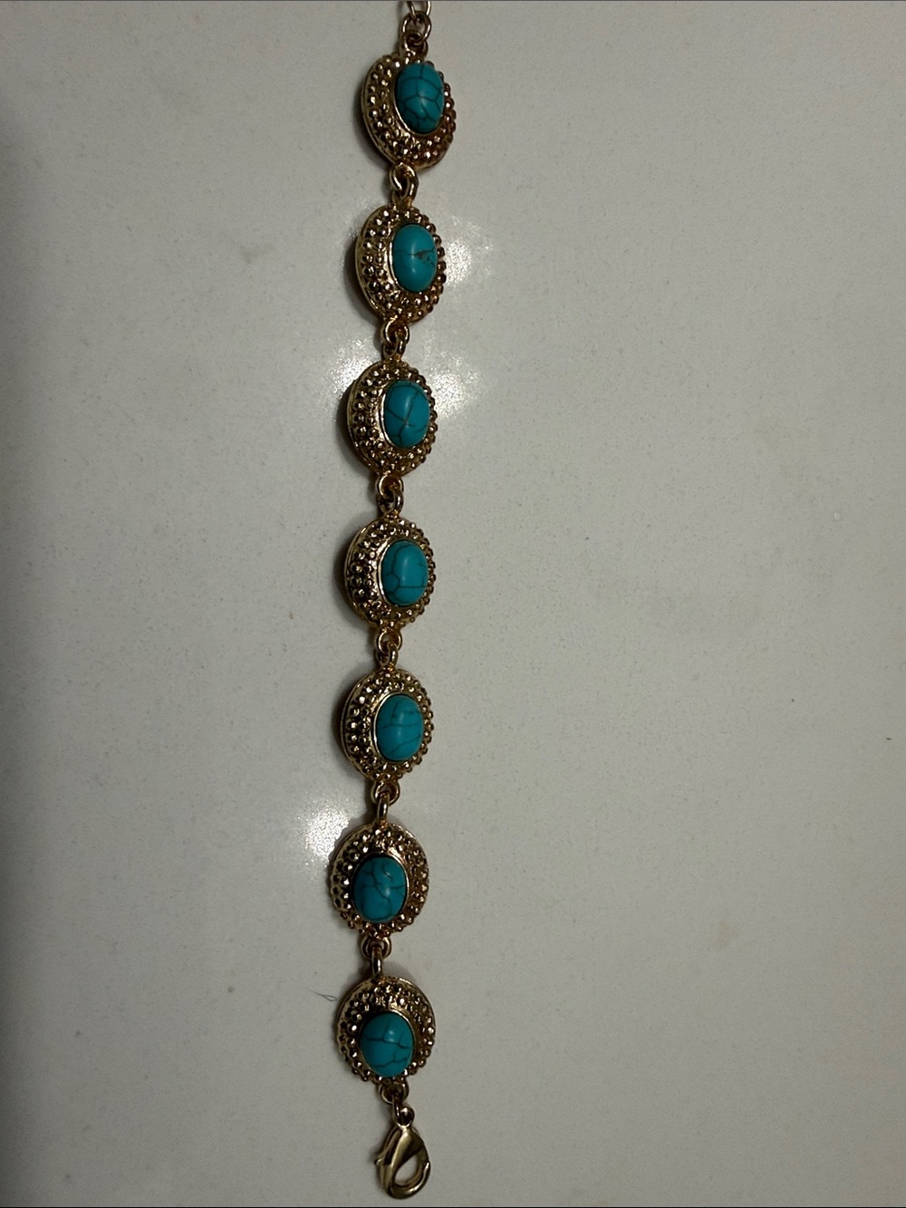 Gold-Tone Bracelet with Turquoise Cabochons